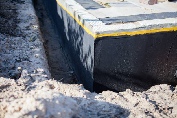 Professional Exterior Waterproofing technician working in Weehawken, NJ